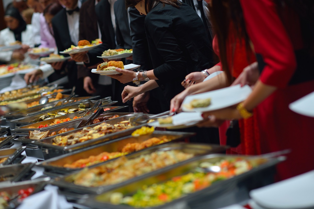 people group catering buffet food indoor in luxury restaurant with meat colorful fruits  and vegetables